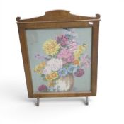 Vintage floral tapestry needlepoint fire screen, featuring a still life of flowers in a vase, housed