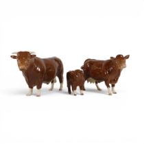 A set of three Beswick Limousin cattle models, bull, cow and calf, all marked BCC 1998 (3) (rough