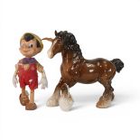Beswick model of a bay Cantering Shire, model no.975, together with 1960's R. Dakin Disney Pinocchio