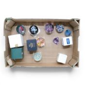 A collection of mainly Caithness glass decorative paperweights featuring intricate millefiori