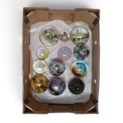 A collection of Glass paperweights featuring intricate millefiori patterns, abstract designs and