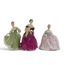 Royal Doulton lady figures featuring Adrianne HN2152, Fair Lady HN2193 and Charlotte HN2423. (3)