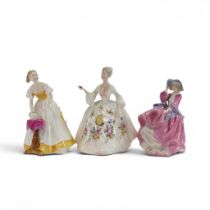 Royal Doulton lady figures featuring Top O'the Hill in Pink HN1849, Diana HN2468 and Happy