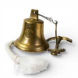 Decorative Brass Ships Bell dated 1827 with Anchor wall mount. Bell rings intact with an