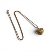9ct gold heart shaped locket with 9ct gold necklace, 5.9g.