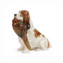 Royal Doulton model of a seated Spaniel with pheasant HN1001, h.17cm.