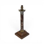 Marble table lamp of Corinthian column form, raised on a hardwood stepped base, overall height