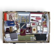 A large collection of costume jewellery including watches, pendants and chains, brooches, pocket
