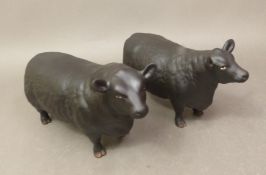 Beswick matt Aberdeen Angus bull 1563, together with an Aberdeen Angus cow 1562 (2)