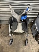 Drive DeVilbiss lightweight folding transit wheelchair in grey with footrests. (New & Fully