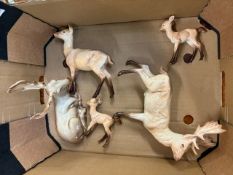 Two Beswick Stags- lying & standing, a Doe, and two fawns, all gloss (5)