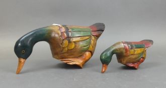 Two wooden ornamental ducks, hand-painted in vibrant colours. (Tallest: 16.5cm) (2)
