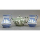 Wedgwood Jasperware To Include: Sage Green Teapot, Together With Two Pale Blue Jugs (3)