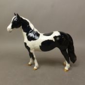 Beswick Pinto Pony, first version, piebald, no. 1373.