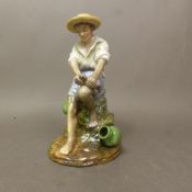 The Fisher Boy figurine by Reg Johnson Studio Potter, height 18cm.