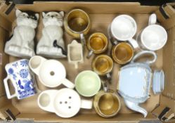 A collection of Wade ceramics to include tankards, teapot, mugs, novelty moneyboxes and shaving