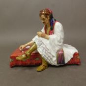 Albanian Dice Player figurine by Reg Johnson Studio Potter, height 14cm.