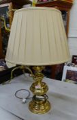 Modern brass table lamp of good proportions, with cream pleated shade, overall height 69cm.