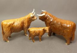 Beswick Highland family to include a Highland bull, cow & calf (3).