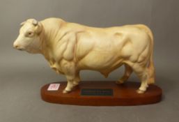 Beswick Connoisseur model of a Charolais Bull, raised on a wooden plinth, height 19.5cm.