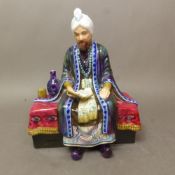 Omar Khayyam figurine by Reg Johnson Studio Potter, height 21cm.