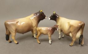 A Beswick Jersey bull, C H Dunsley Coy Boy number 1422, a Jersey cow C H Newton Tinkle 1345 and a