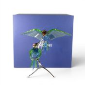 Swarovski Paradise Bee-eaters part of the “Silver Lake” series. The two birds in Peridot crystal are