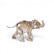 Swarovski Elephant Calf (1142862) retired 2013 designed by Elisabeth Adamer presented in Light