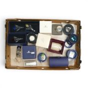 A collection of boxed Swarovski renewal gift crystal items including Blue Tulip (606546), Yellow