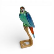 Swarovski Crystal Paradise Macaw (chrome green), mounted on wooden perch, by Roland Schuster,(