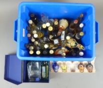 A collection of approximately fifty alcohol and Whiskey miniatures including Bell's, The Macallan,