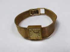 A 9ct retro ladies Rotary wrist watch with integral strap, length 18cm weight total 24.2g