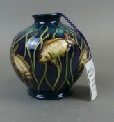 A Moorcroft vase in the Lagoon design by Marie Penkethman, app height 11cm, marked trial 25/6/09,