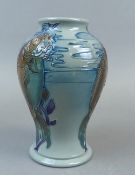 A Moorcroft trial vase in the Carp Tail dance design by Kerry Goodwin, app height 15cm , marked