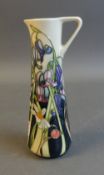 Moorcroft pitcher in the Wild Meadow pattern, by Emma Bossons. (H: 17cm)