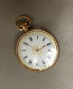 Ladies 9ct gold cased fob watch, overall weight 32g, case diameter 33mm.