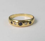 Yellow metal ring, set with sapphires & diamonds, electronically tested to be 18ct gold, size O,3.