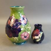 Moorcroft vase in the Anemone pattern by Walter Moorcroft, together with smaller vase in the Anemone