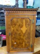 Small walnut veneer corner cabinet, H 78cm, W 56cm.