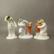 Three Coalport The Snowman figures, The Special Moment, Dancing at the Party and The Greeting,