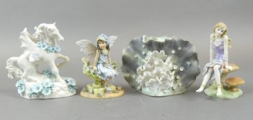 A selection of porcelain Mystical Figures to include:- Fairy sitting in a flower pot, Fairy on a