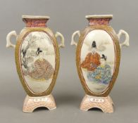 A Pair of early 20th Century Japanese Satsuma vases of Flask form each on a pedestal foot, app