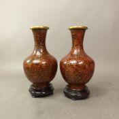 Two Chinese Cloisonné vases on hardwood stands, overall height 18cm (2).