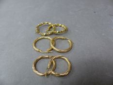 Three pairs of 9ct gold hoop earrings, 7.1g