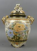 A Japanese Satsuma handled Jar wth Pierced cover, modelled with handle and finial in the form of