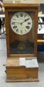 A Factory 'clocking on' time record machine by The British Time Recording company, app height 83cm