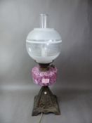 Early 20th century oil lamp, converted to electric, overall height 57cm.