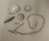 A collection of 925 silver items including a watch chain, brooches, a gold on silver ring, etc,