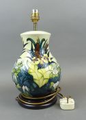 Moorcroft table lamp in the Lamia pattern, by Rachel Bishop. (height to top of fitting: 34cm)