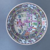 A Late 19th Century Chinese bowl , typically heavily decorated with Chinese figures and Boy on a